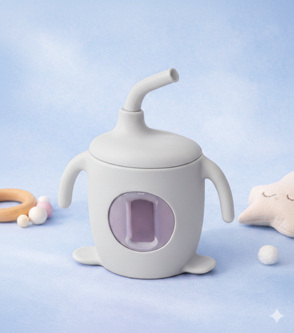 White baby sippy cup with a purple interior on a light blue background