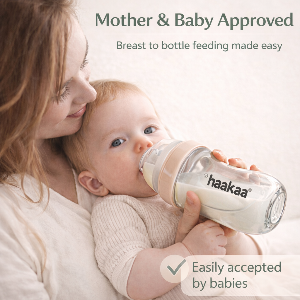 Woman holding a baby and a Haakaa bottle with text 'Mother & Baby Approved' and 'Breast to bottle feeding made easy'.