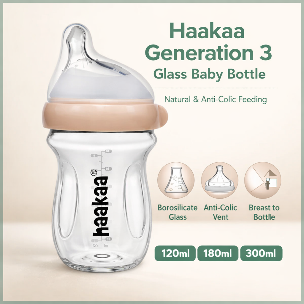 Haakaa Generation 3 glass baby bottle with beige cap on a light beige background
