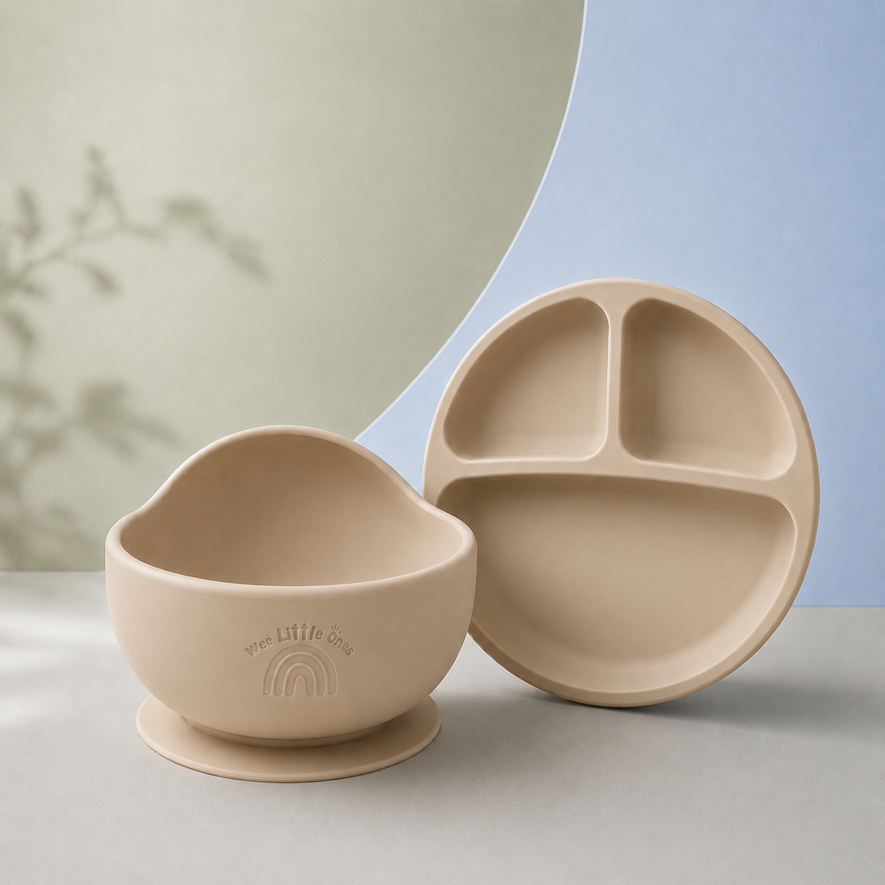 Beige ceramic bowl and plate set on a neutral background