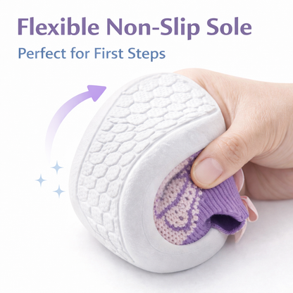 White shoe with a purple sole held by a hand, emphasizing the non-slip sole.