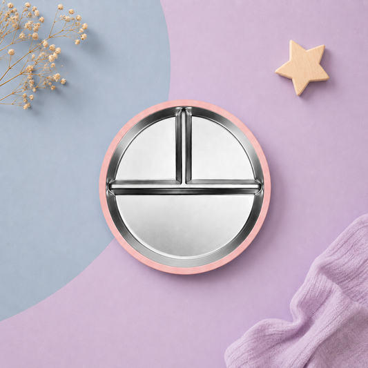 Round pink plate with silver on a soft pink background