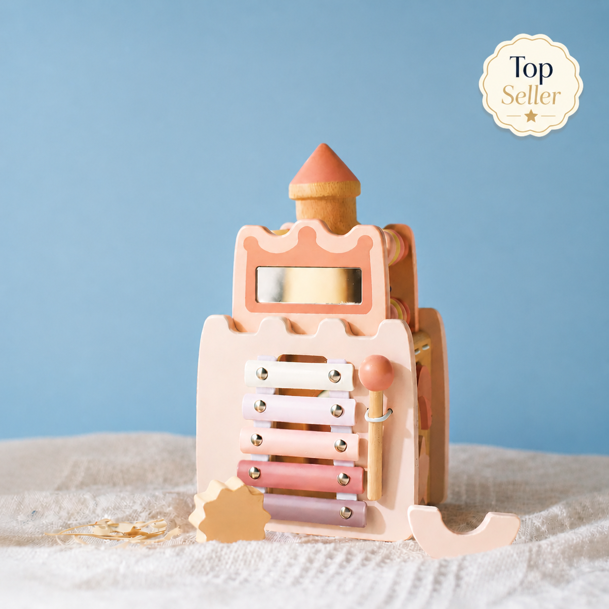 Wooden toy with pastel colors on a blue background
