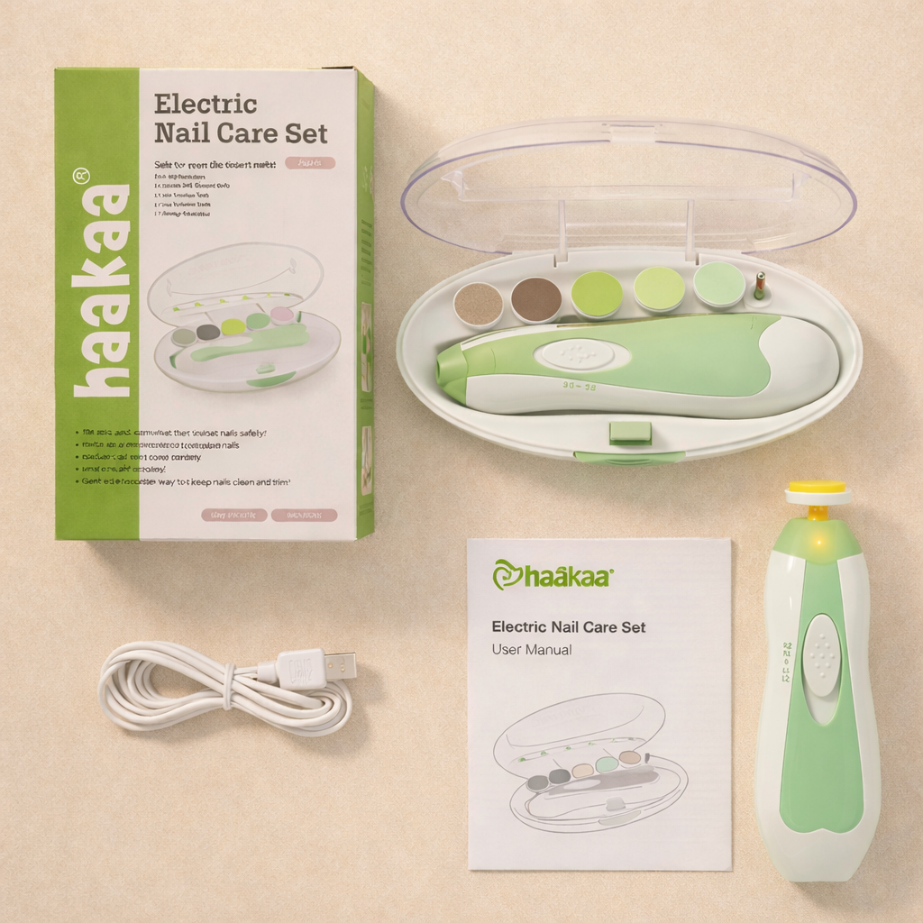 Haakaa electric nail care set with packaging, tool, cable, and manual on a beige background