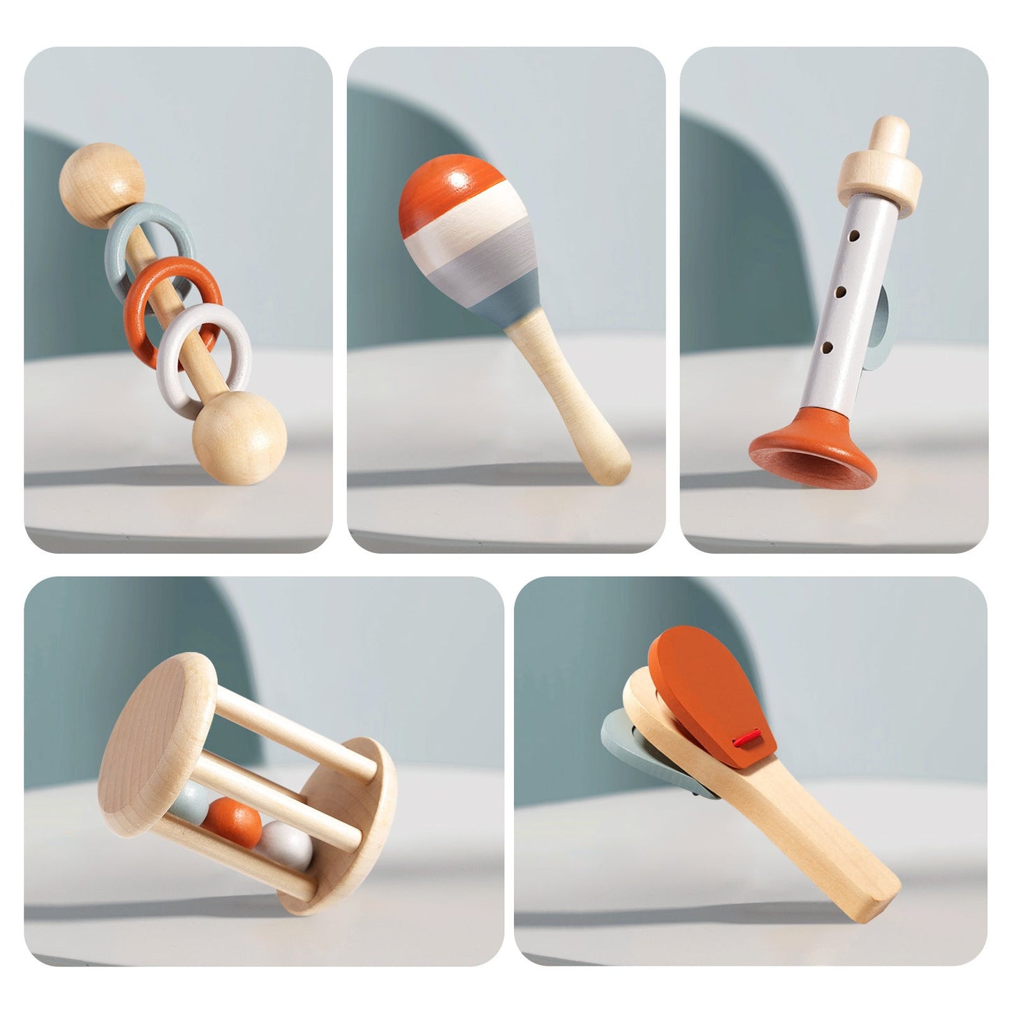 Wooden baby rattle with rings, wooden maraca with orange and gray stripes, wooden whistle with orange base, wooden drum toy.